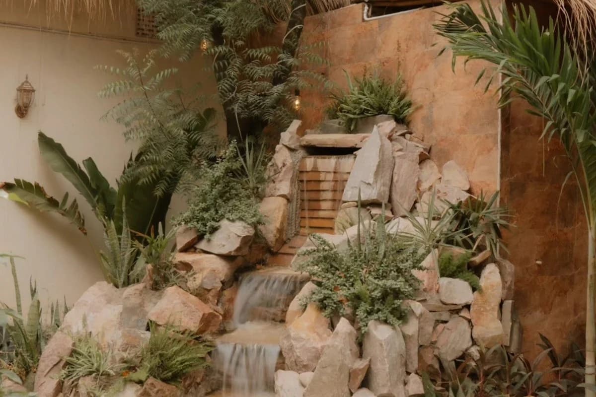 The café's garden courtyard and waterfall